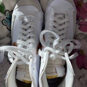 Nike high top white leather with leopard Nike swirl. Size 10